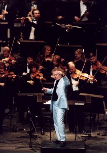 Director Robert Groslot conducts orchestra and choir